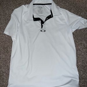 Men’s white and black Oakley polo shirt.